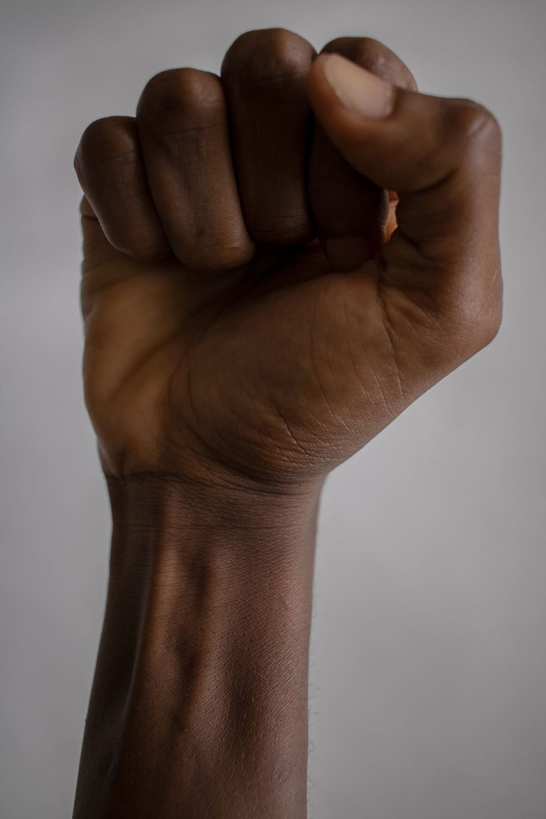 Aggressive phase against franchisors - an image of a fist symbolizing solidarity